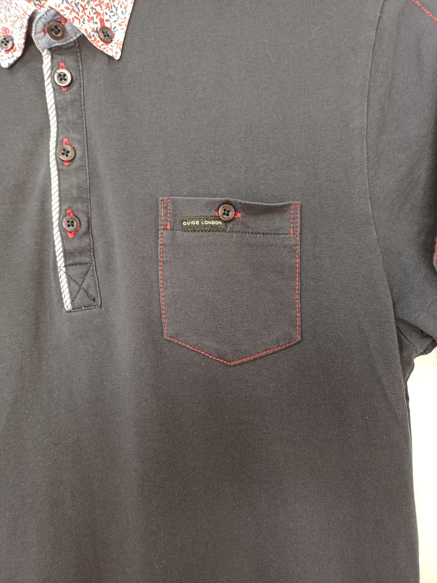 Guide London Men's Navy Polo Shirt with Multi-Colour Patterned Collar Medium 20" PTP 30" Long - Good Condition