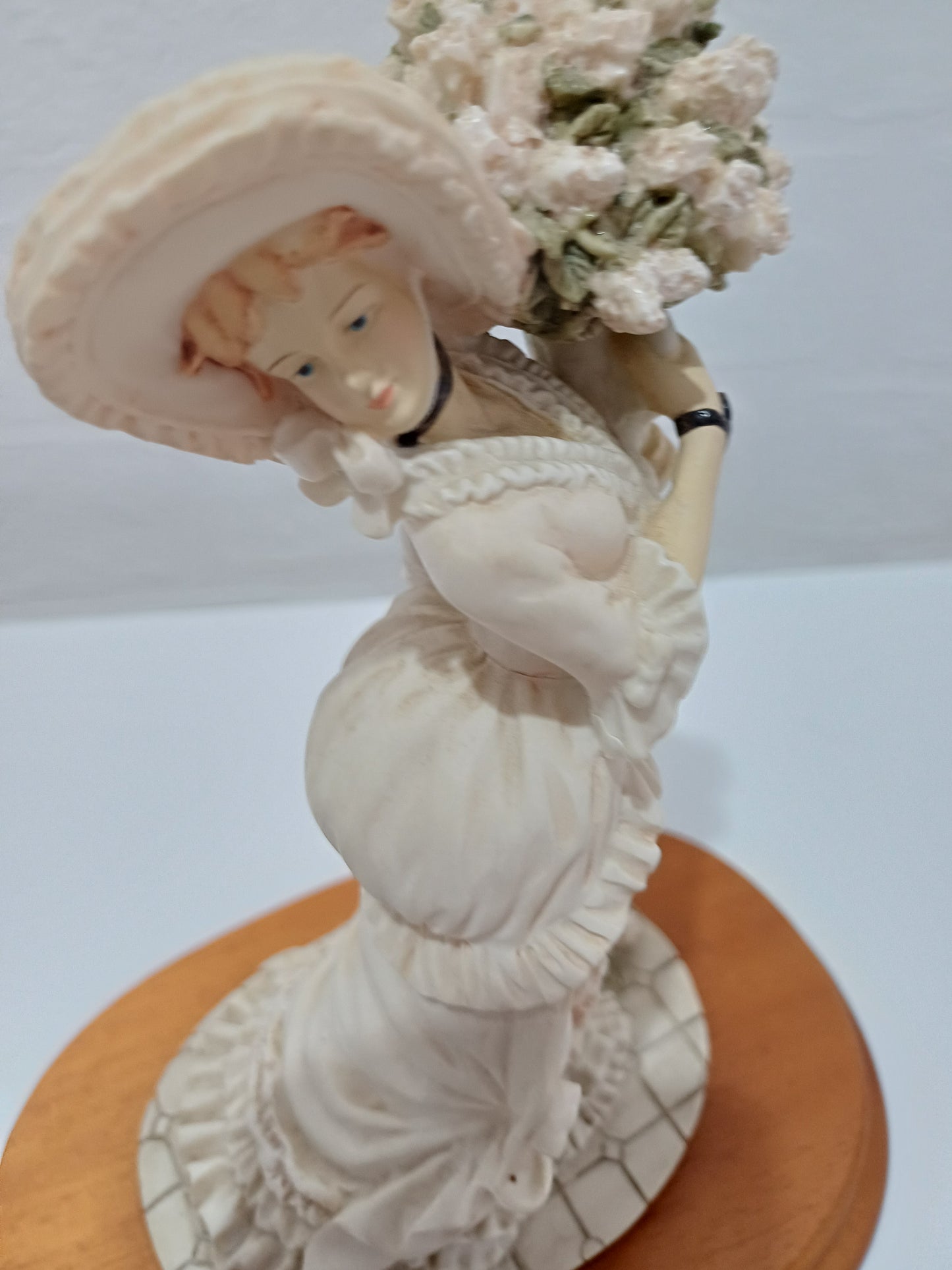The Leonardo Collection Charlotte Figurine Victorian Lady with Vase of Flowers on Wooden Plinth Dated 1991 Approx. 20cm H x 10cm W (with Plinth) - Good Vintage Condition