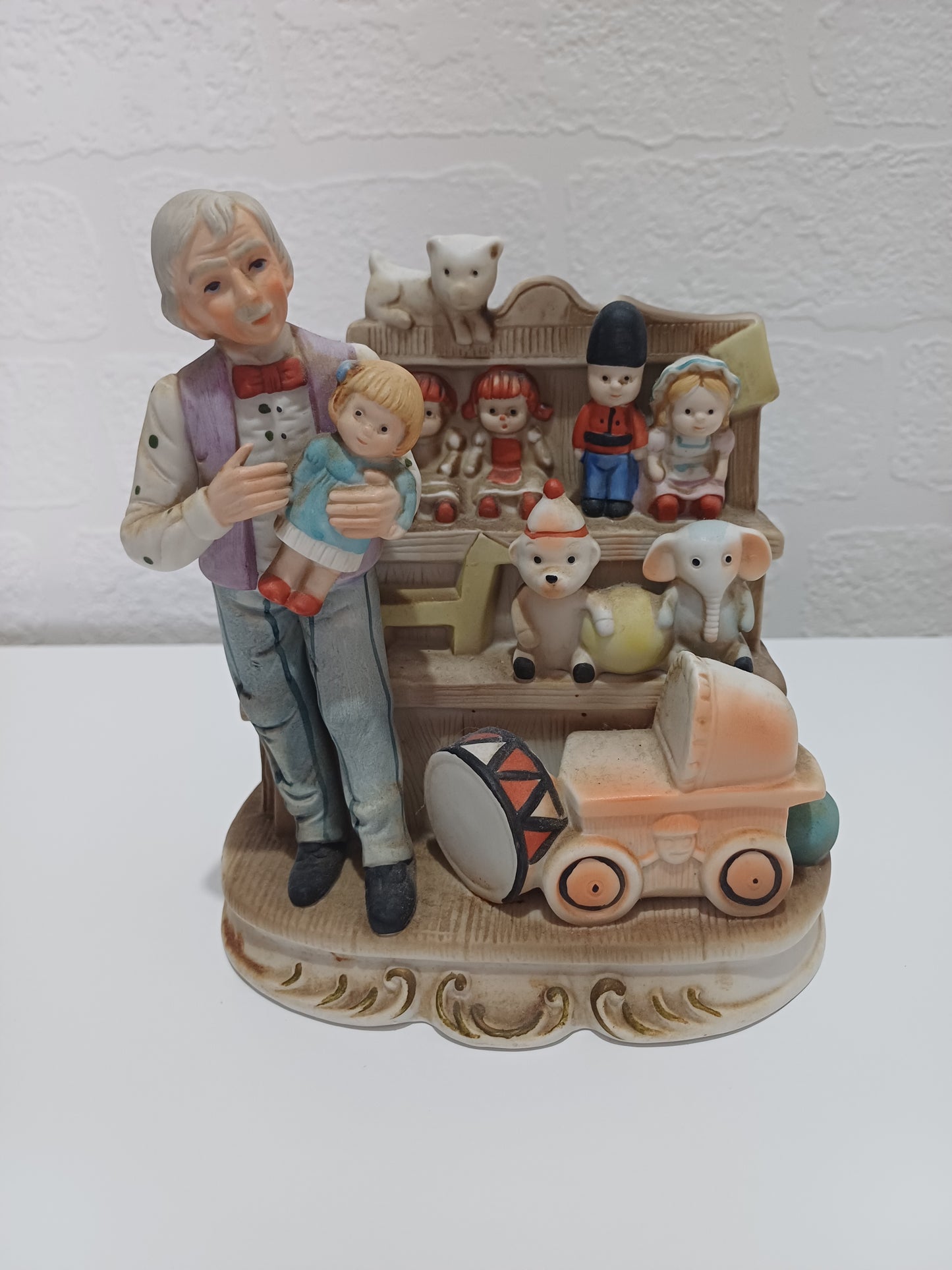 Vintage Style Ceramic Figurine Toy Shop Scene Hand Painted 6.5" High - Very Good Condition