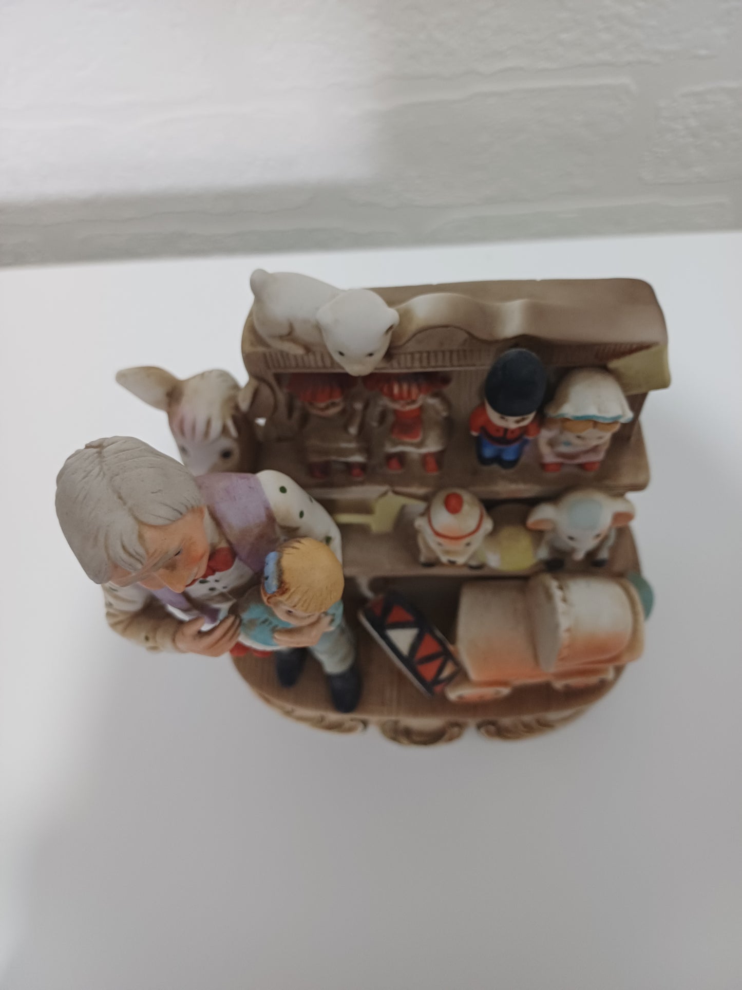 Vintage Style Ceramic Figurine Toy Shop Scene Hand Painted 6.5" High - Very Good Condition