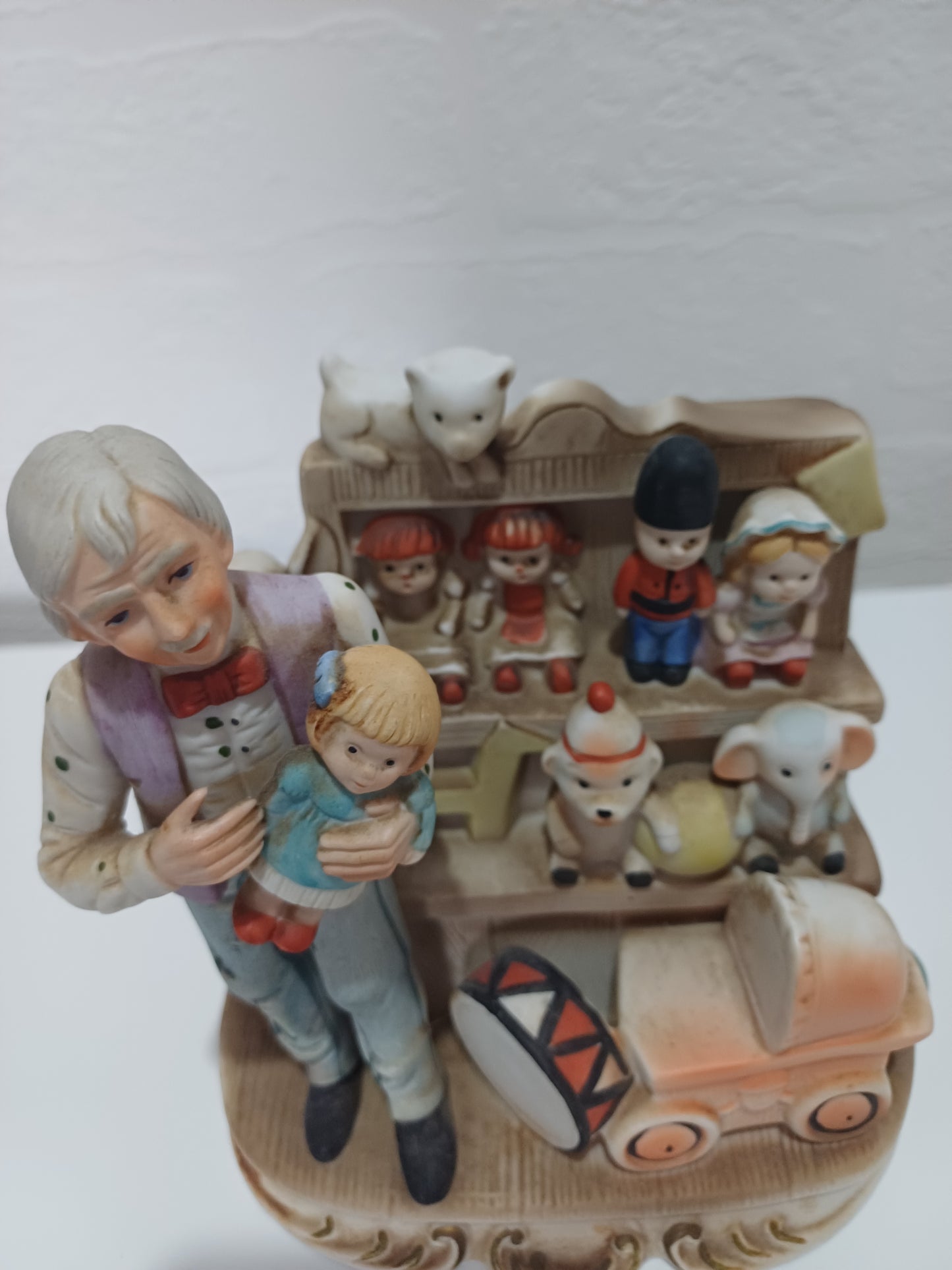 Vintage Style Ceramic Figurine Toy Shop Scene Hand Painted 6.5" High - Very Good Condition