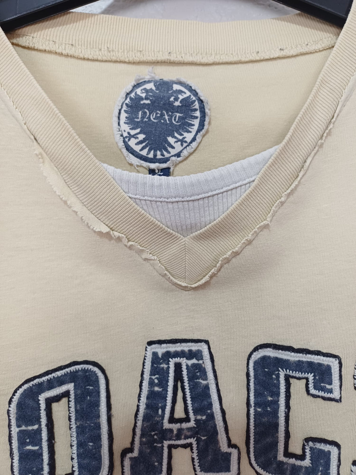 Men's T-Shirt Next Coach Graphic Beige V-Neck Size L Very Good Condition