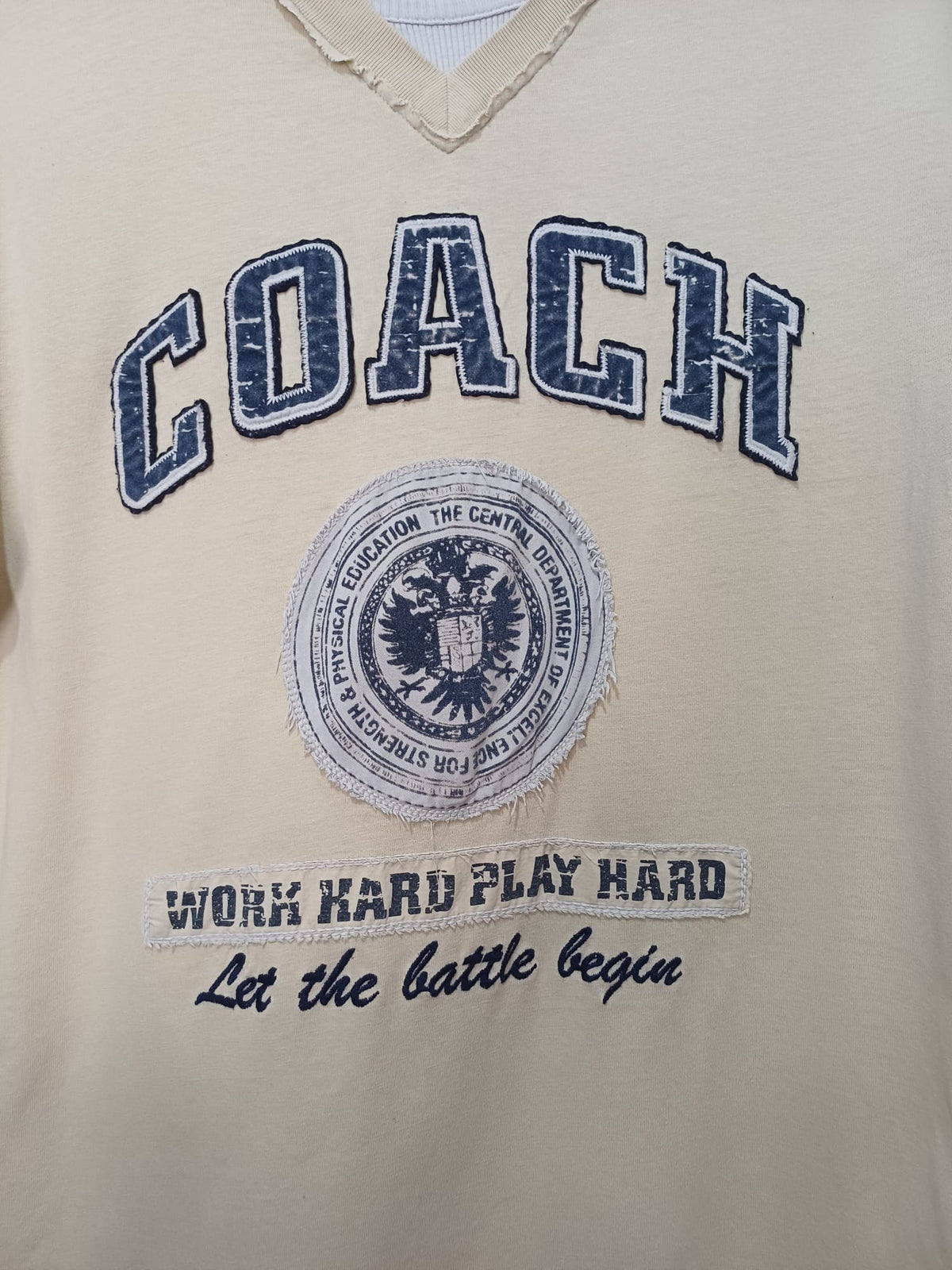Men's T-Shirt Next Coach Graphic Beige V-Neck Size L Very Good Condition